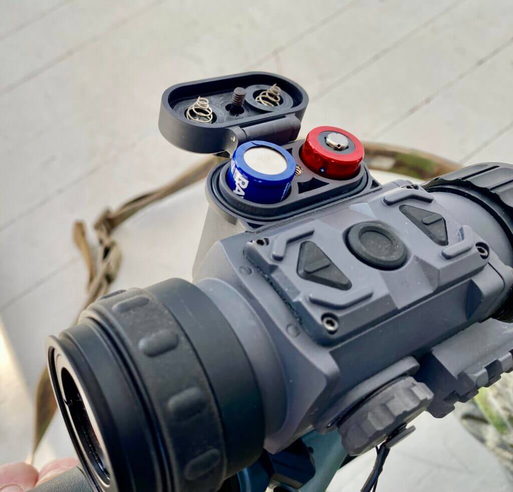 Armasight Commander 640 thermal scope controls and battery compartment detail showing three-button interface