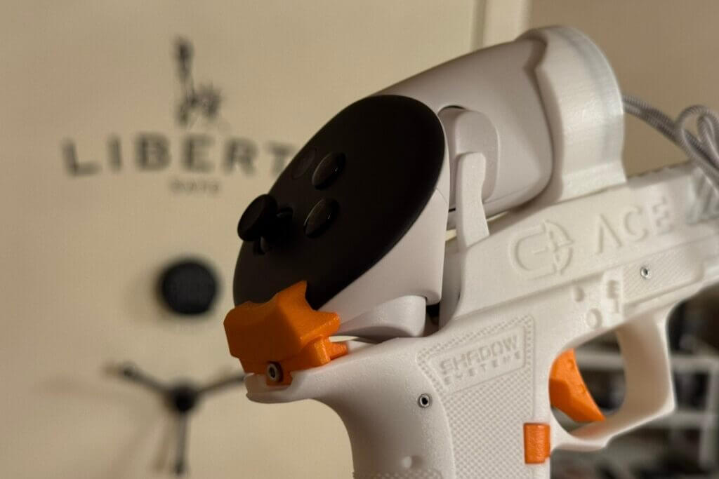 ACE VR handset rear spring-loaded orange tab that locks the Meta Quest controller