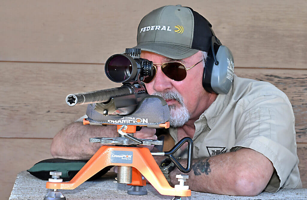 Author testing the Savage 110 KLYM V2 ultralight mountain rifle at the bench