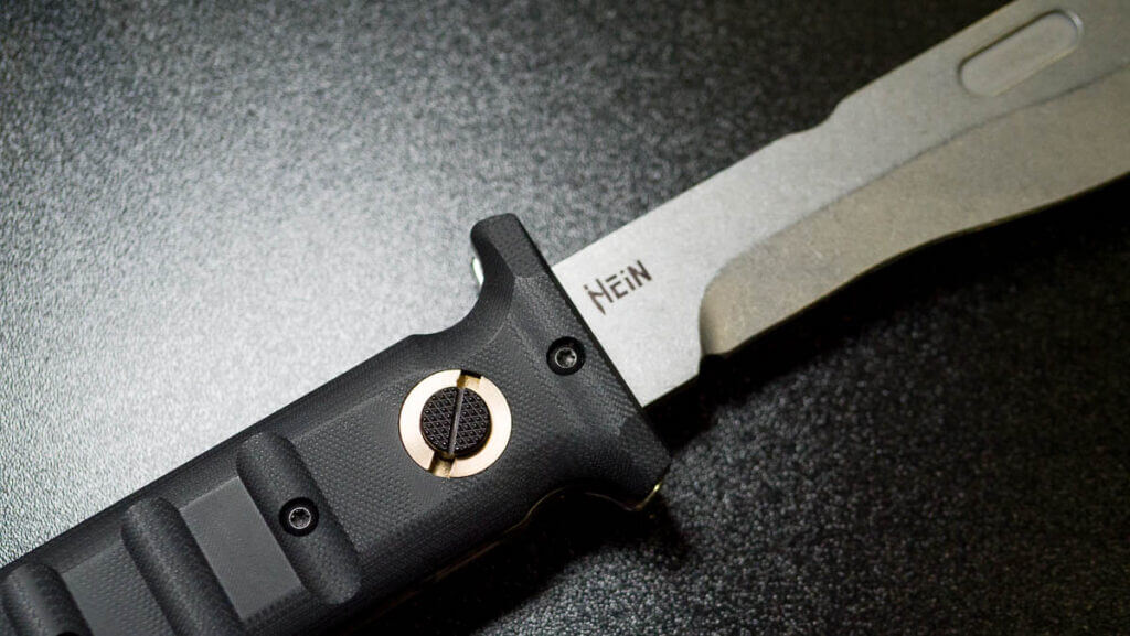 Close up view of the lock button in the handle.