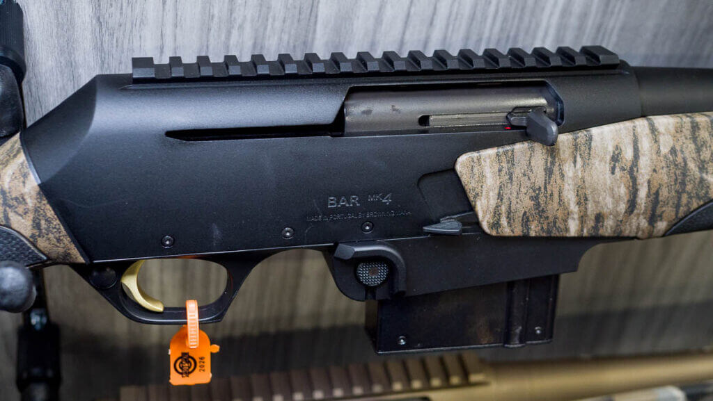 Close up view of the receiver of a right-handed gun with box mag facing right.