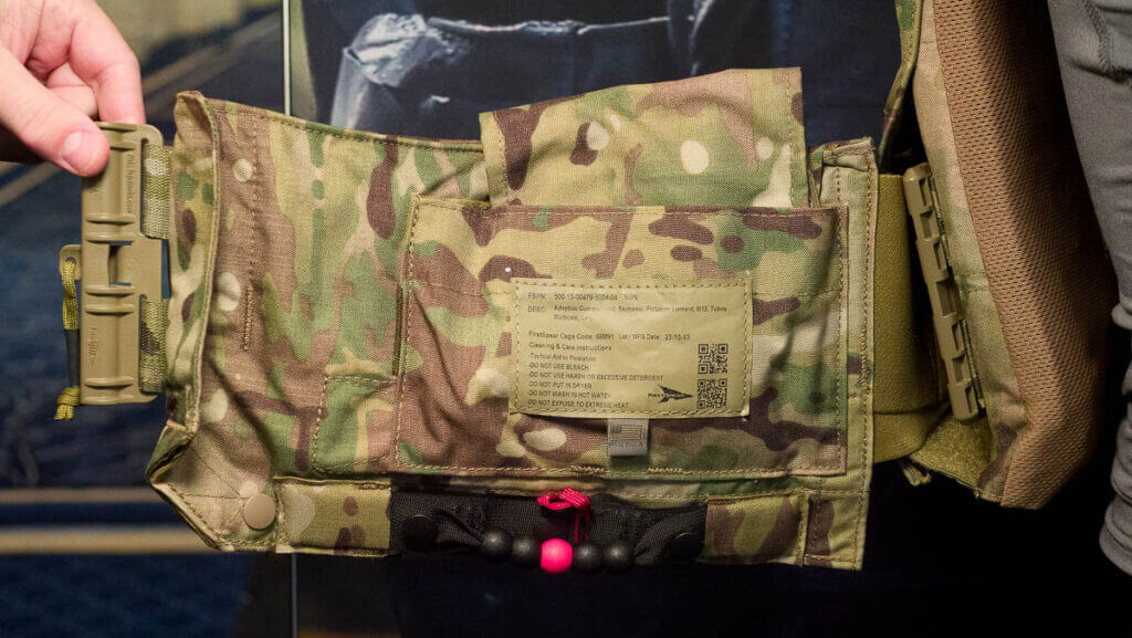 Close up view of the right hand cummerbund pulled open to show the emergency inflation device.