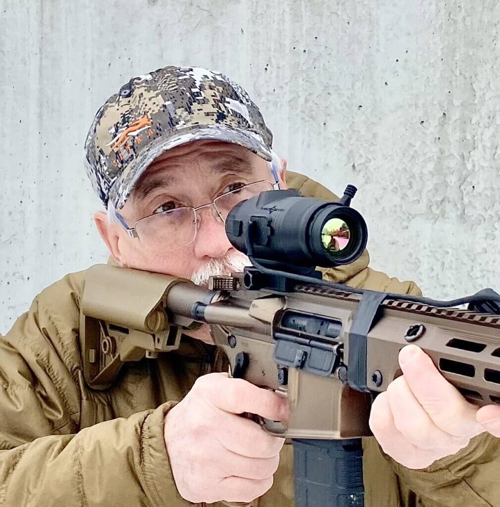 Sightmark Shade thermal scope on rifle setup suited for common coyote and hog night hunts