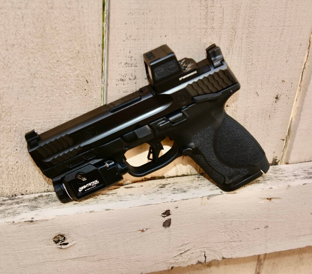 Smith & Wesson M&P 2.0 Compact with Holosun EPS green dot and Nightstick weapon light configured for carry