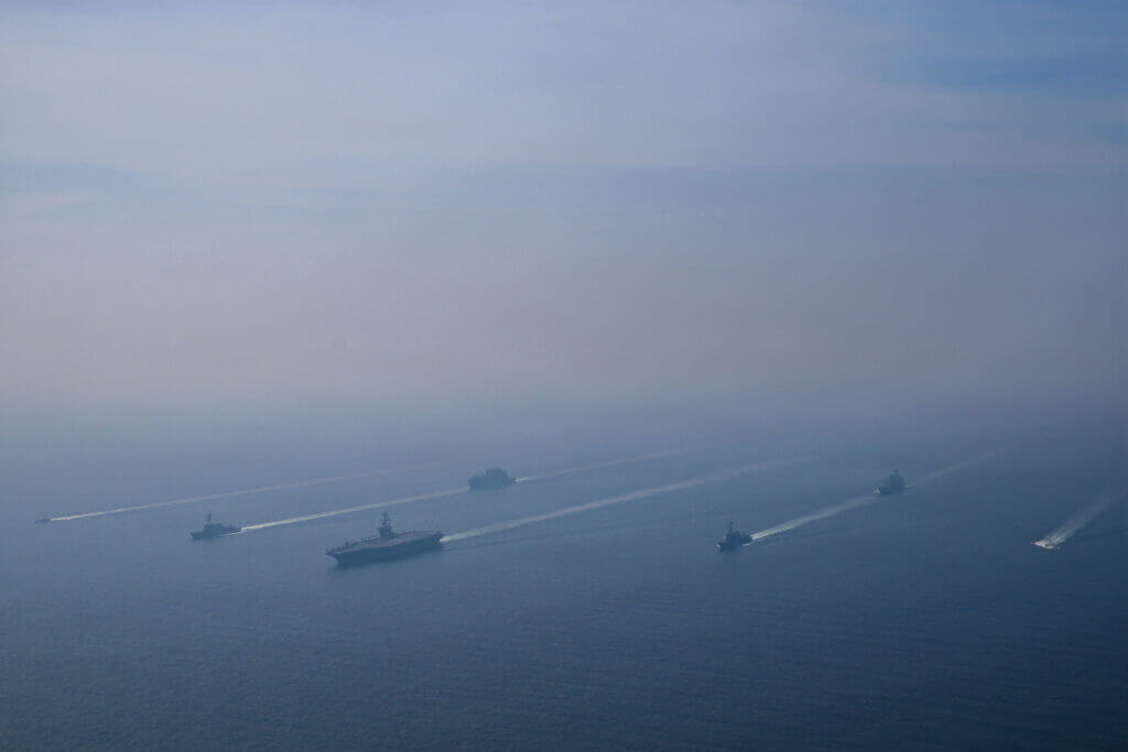 Abraham Lincoln Carrier Strike Group underway at sea showing overwhelming naval power projection