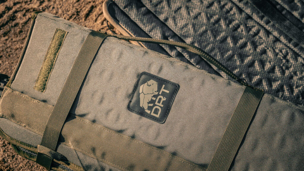 DRT Recon Lounger packed down for backcountry carry showing compact size and five-in-one hunting gear utility
