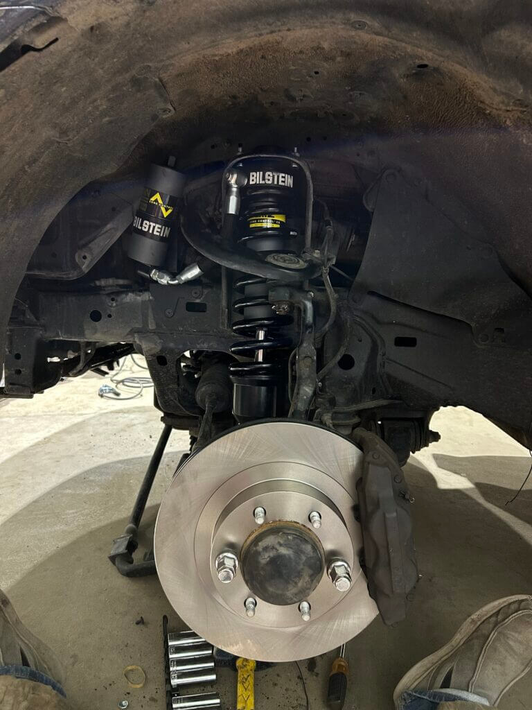 Bilstein 8112 Zone Control CR front shock and coil spring installed on Lexus GX470