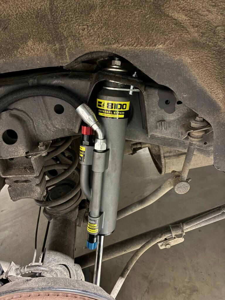 Bilstein 8100 bypass rear shock with adjustable compression knob on Lexus GX470