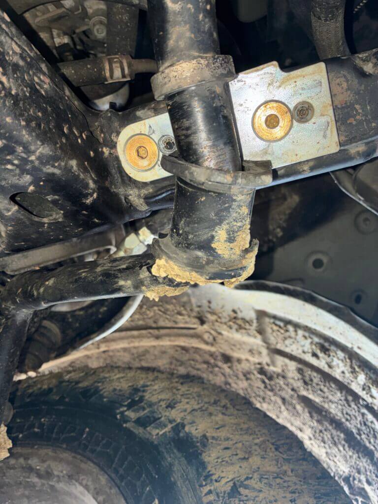 Broken Lexus GX470 front sway bar bracket after aggressive off-road driving with Bilstein 8112 shocks