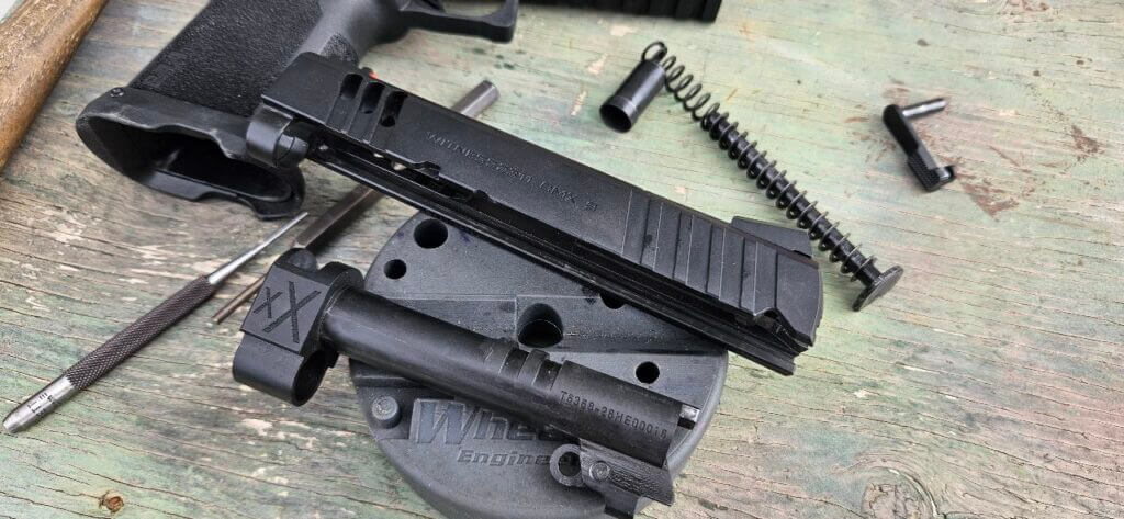 Slide cuts and one-piece compensated barrel on the EAA Witness2311 CMXX