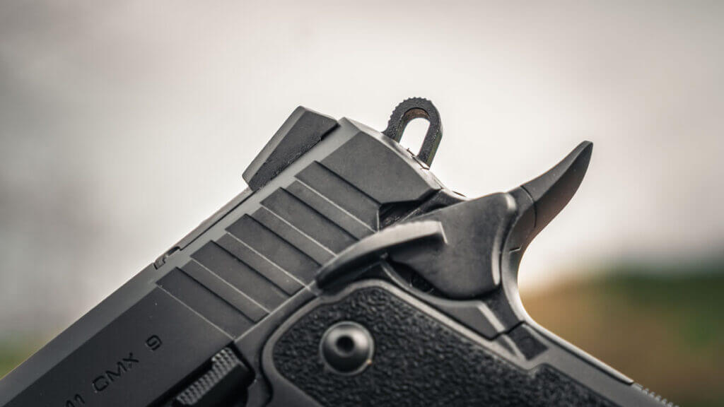 Ambidextrous thumb safety paddles on the EAA Witness2311 CMXX with smooth edges