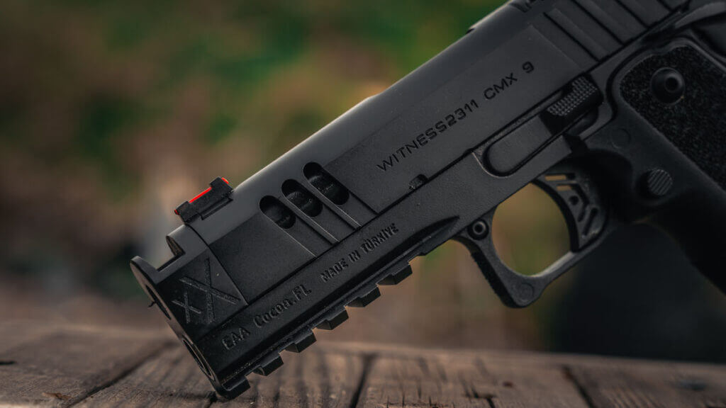 Accessory rail on the EAA Witness2311 CMXX dust cover with narrower than Picatinny slots