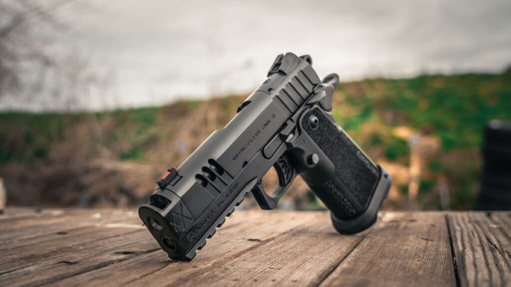 EAA Witness2311 CMXX review pistol on the range showing compact slide and full-size grip