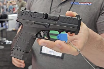 The all-new HK VP9CC in the hands on the showroom floor.