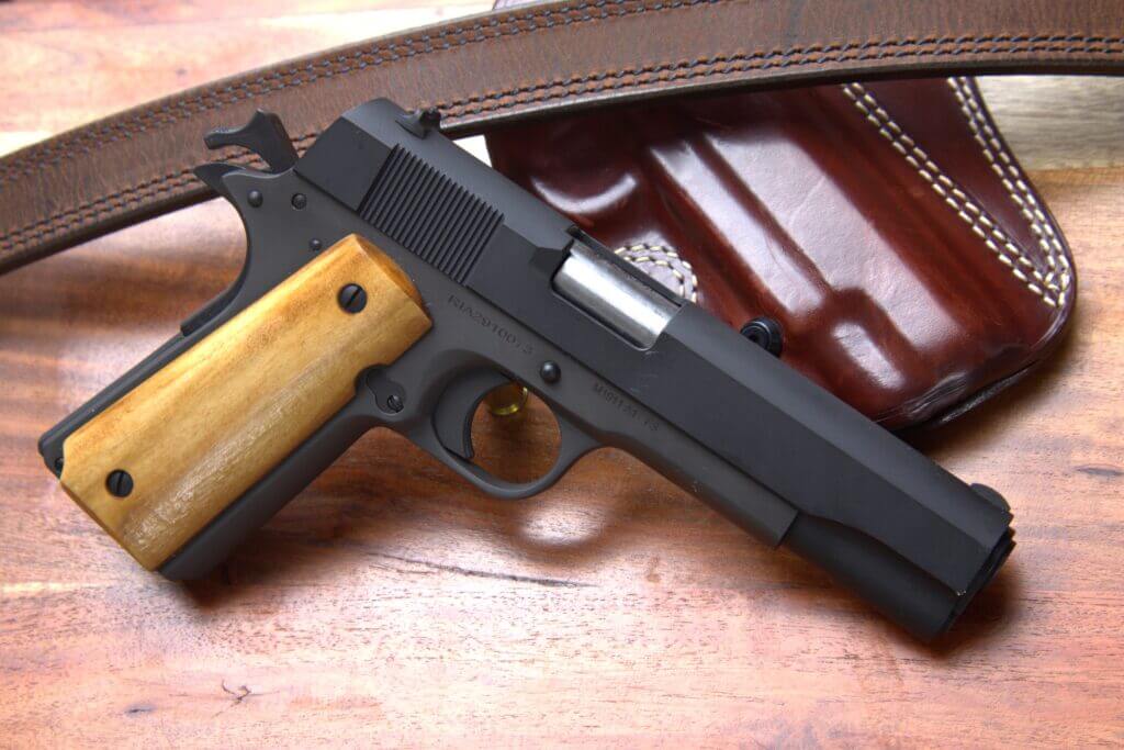 rock island armory gi standard pistol with holster and gun belt