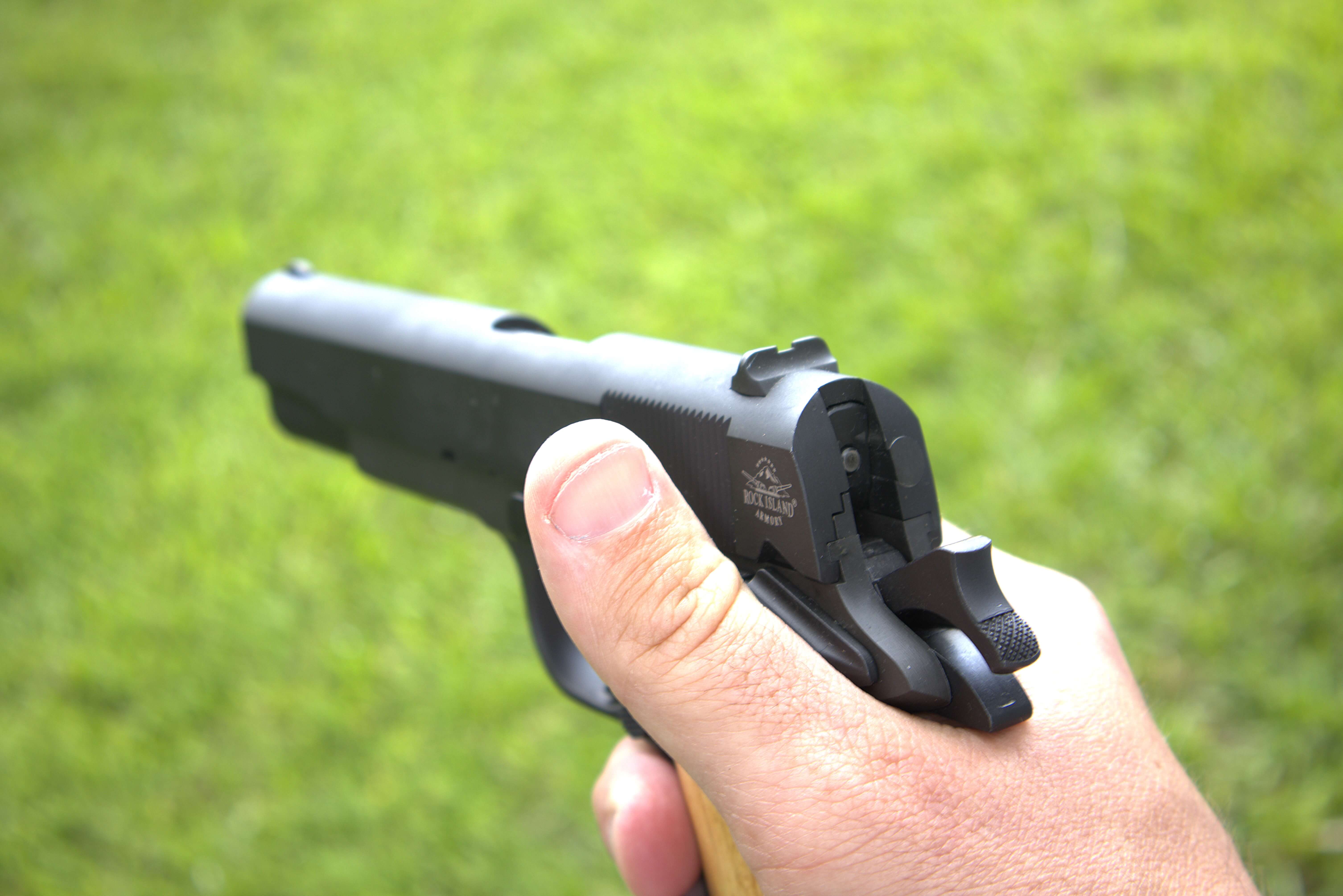 Close view of the Rock Island GI Standard 1911 sights and slide markings