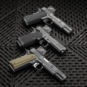 Springfield Armory 1911 DS Prodigy and TRP pistols equipped with Aimpoint COA enclosed-emitter optics.