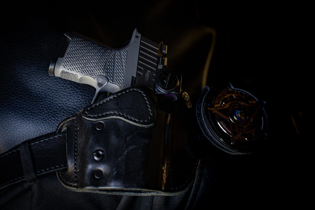 SIG P365 daily carry setup with holster and everyday concealed carry gear