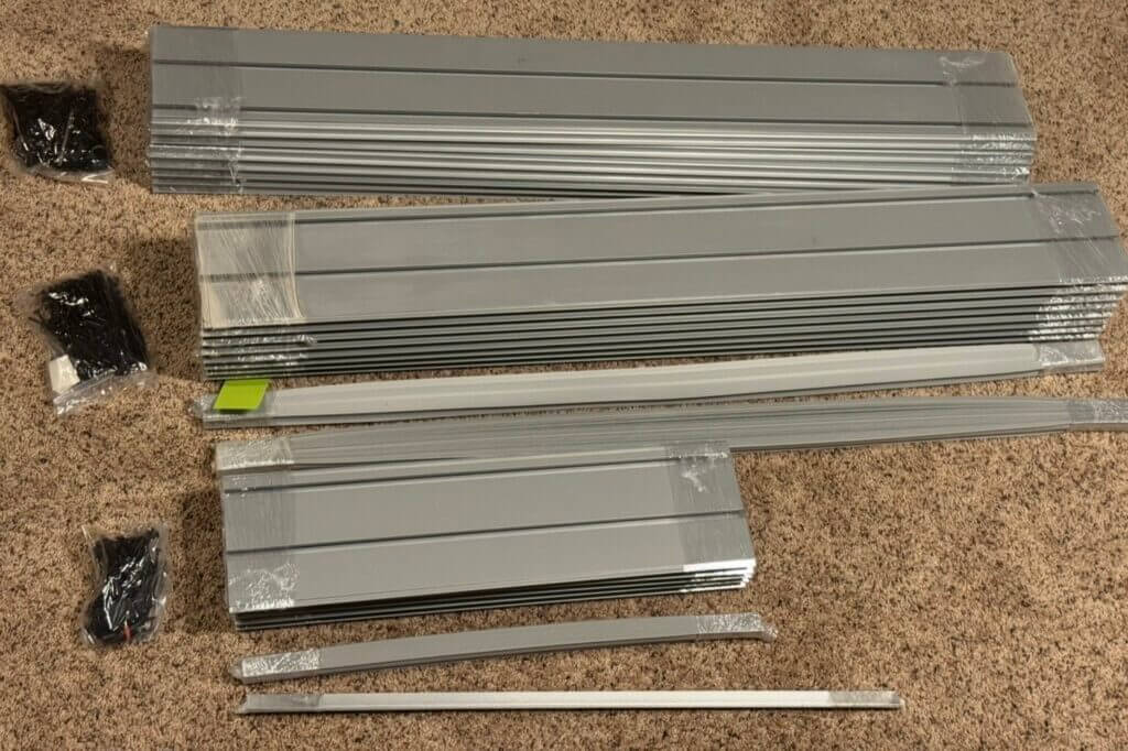 Packaged Hold Up Displays Gun Wall metal slatwall panels ready for installation