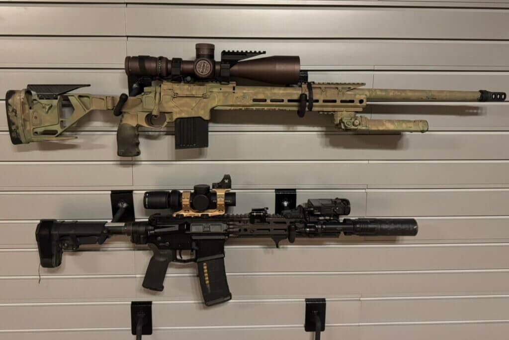 Adjustable Hold Up Displays rifle hooks angled to keep two rifles perfectly level