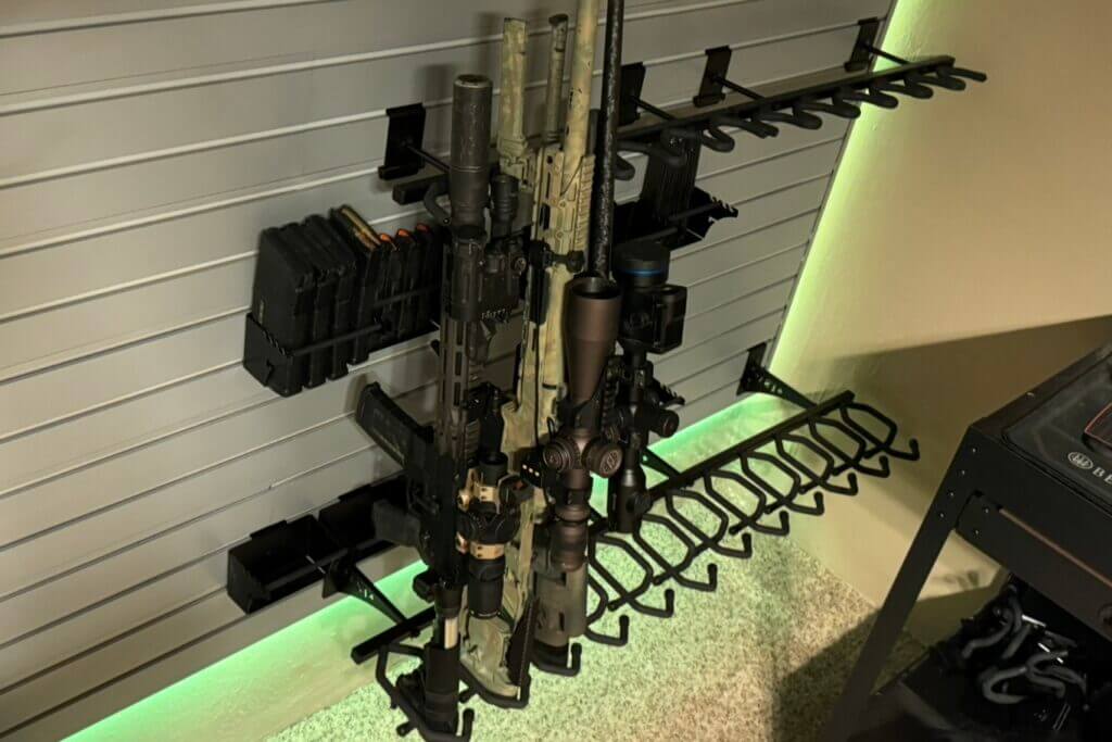 Two vertical Hold Up Displays 6 Gun Racks storing long guns side by side