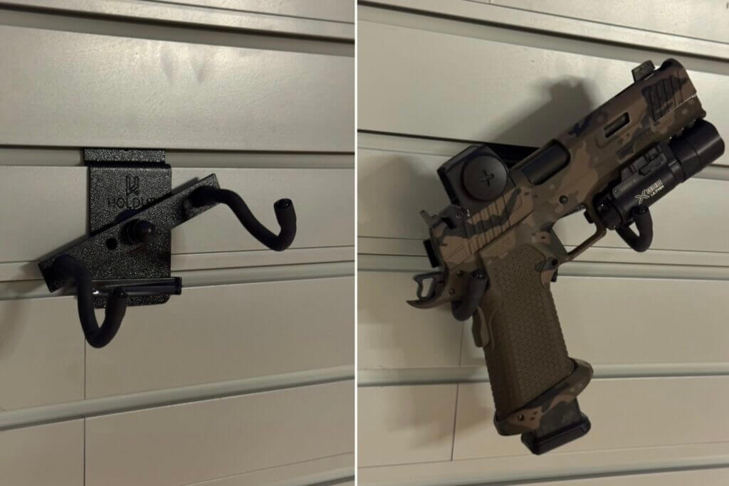 Adjustable Hold Up Displays pistol mount hooks and center bracket on the modular gun wall