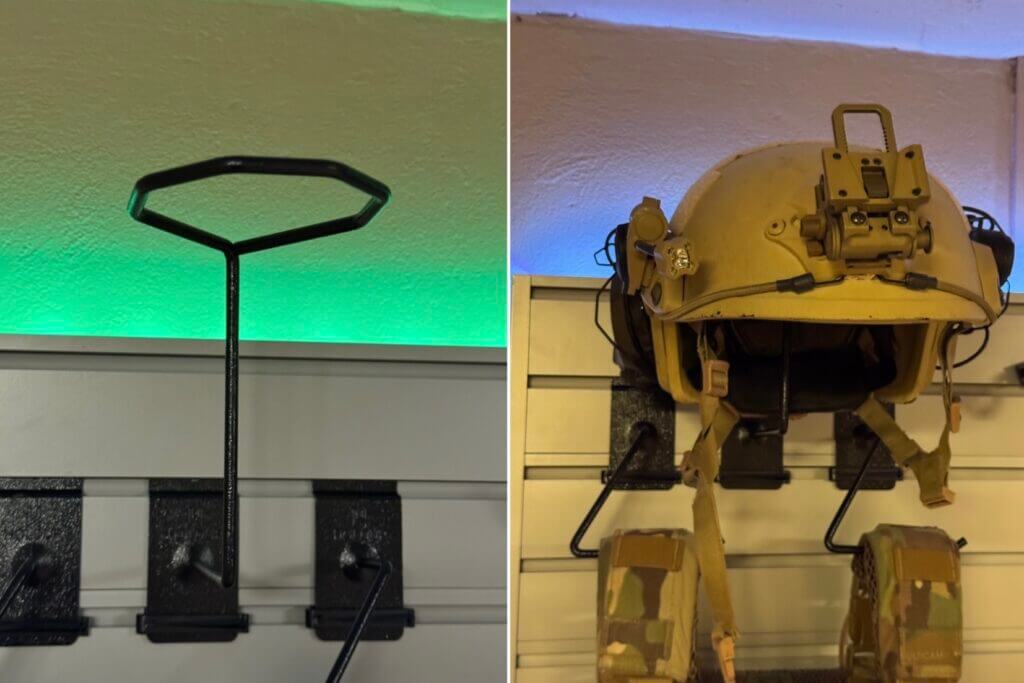 Helmet secured on a Hold Up Displays helmet mount in a custom safe-room gun wall setup