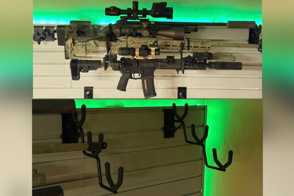 Horizontal three-gun rifle rack mounted on the Hold Up Displays Gun Wall system