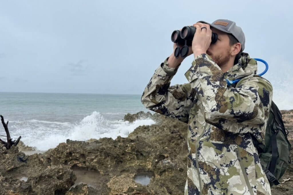 Hunter using Talon HD 10K binoculars in Kings Camo apparel during an outdoor Father’s Day adventure