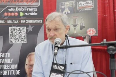 John Lott sitting down for an interview at NRA 2026.
