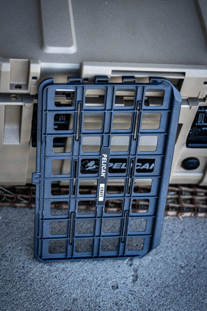 Pelican CRATE 45L divider panel showing attachment options for pouches and modular gear organization