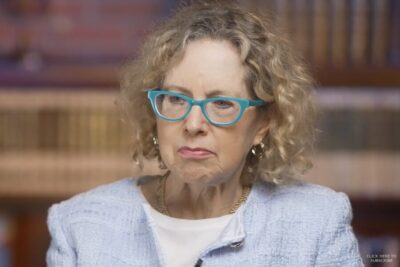 Heather Mac Donald speaks during an interview discussing gun violence, policing, crime statistics, and media coverage.