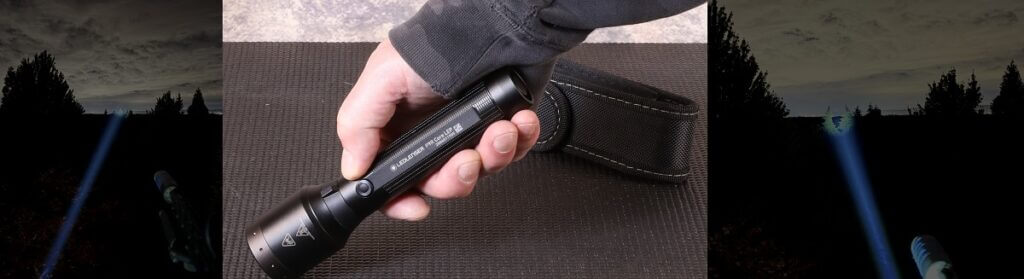 Ledlenser P9R Core LEP flashlight projecting a tight laser excited phosphor beam into distant trees