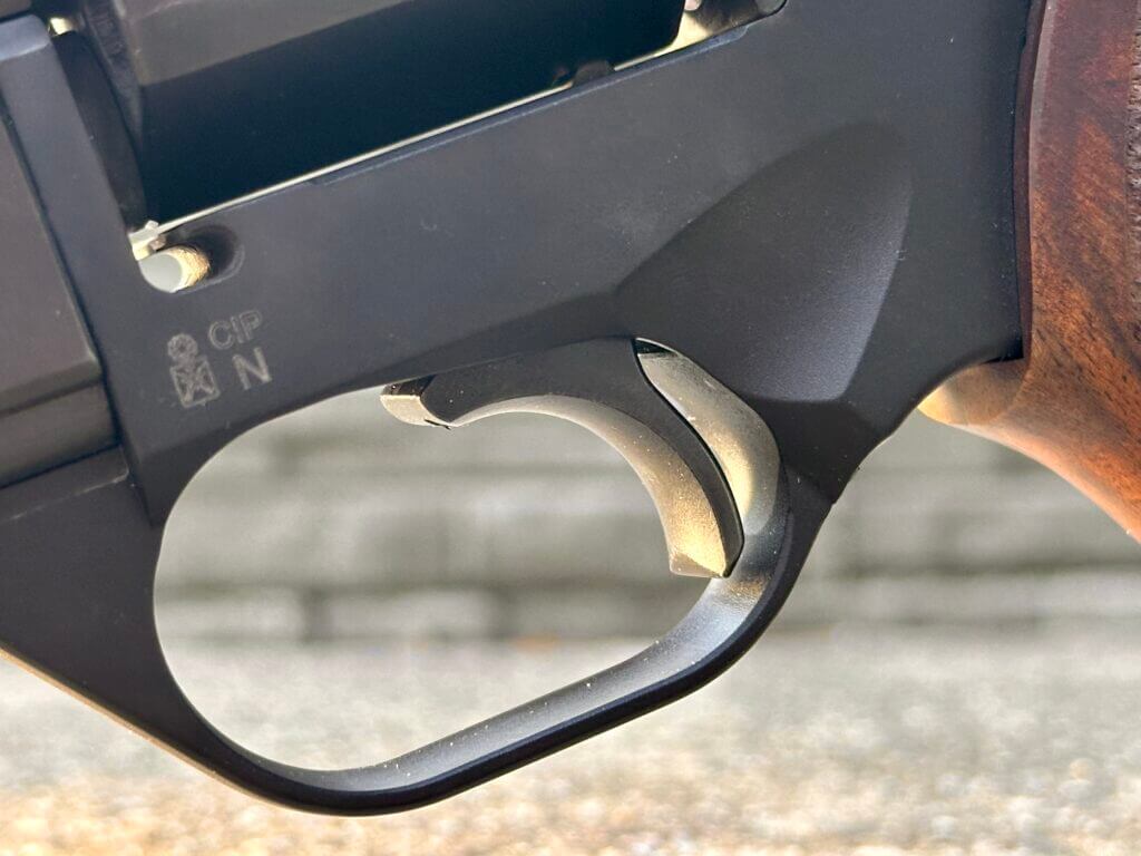 Closeup of the Chiappa Rhino 60 DS 10mm trigger cocked for a crisp 2.5 lb single-action break