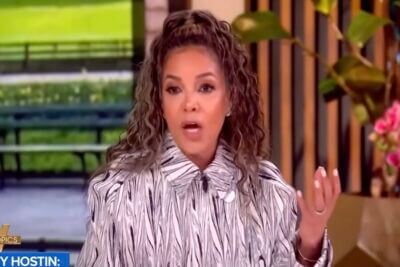 Sunny Hostin speaks during an episode of The View while discussing why seeing neighborhoods filled with American flags makes her feel unsafe.