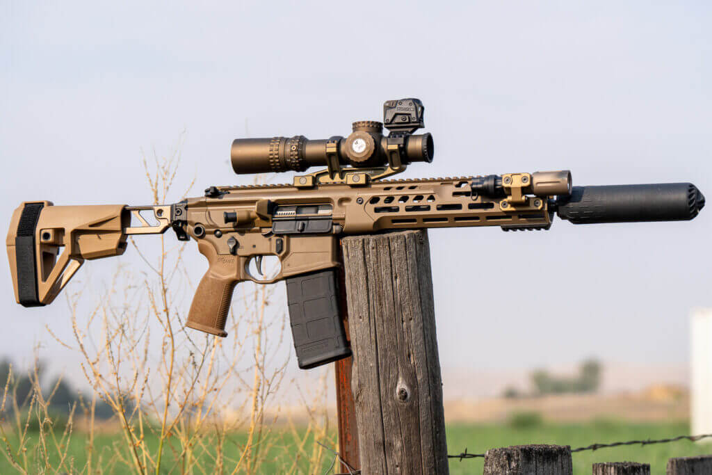 Steiner MPS 2.0 mounted above a Nightforce ATACR 1-8x on a SIG MCX