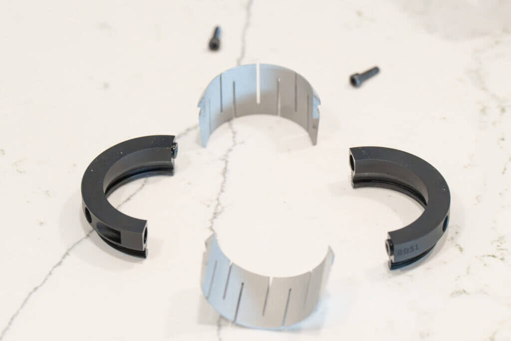 Force 360 scope mount collet components illustrating even radial pressure around round objects