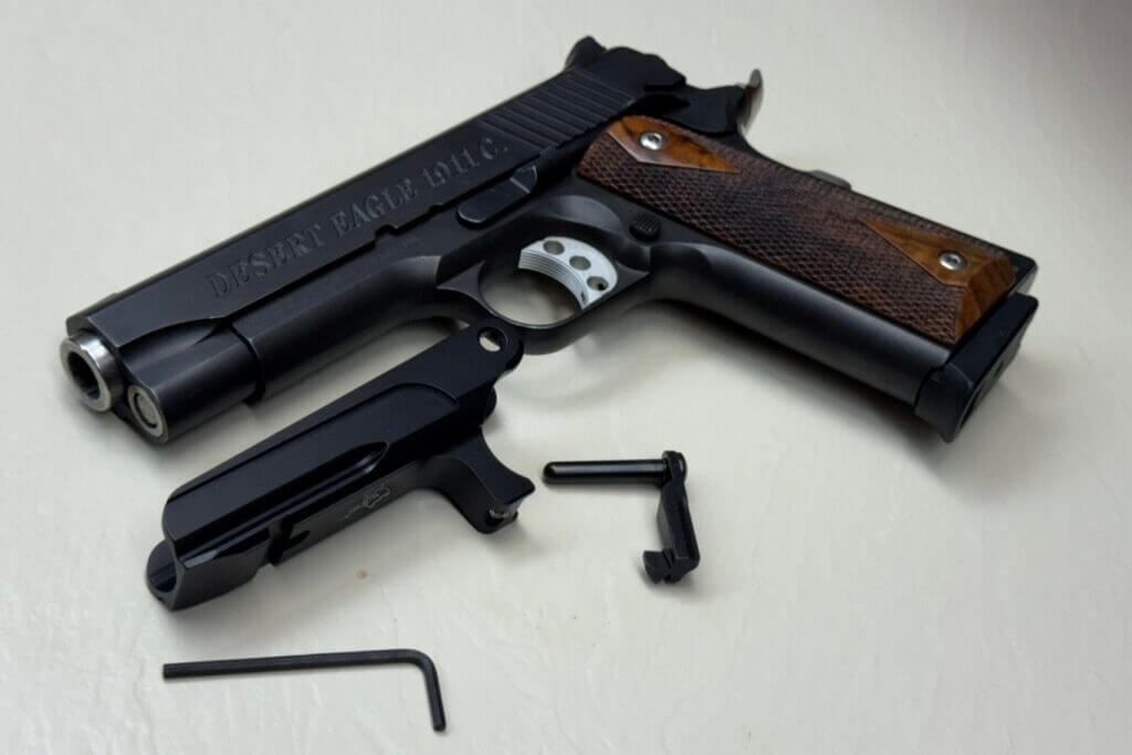 MisterSeven 1911 rail attached using the included elongated slide release