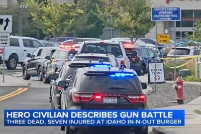 Law enforcement officers secure the scene outside the Twin Falls, Idaho In-N-Out Burger after a mass shooting that left three people dead and seven injured.