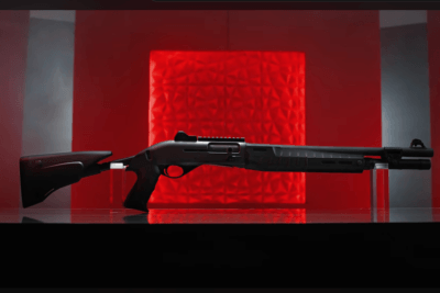 Benelli M2-G1 Tactical 12-gauge semi-automatic shotgun with fixed stock and ghost-ring sights
