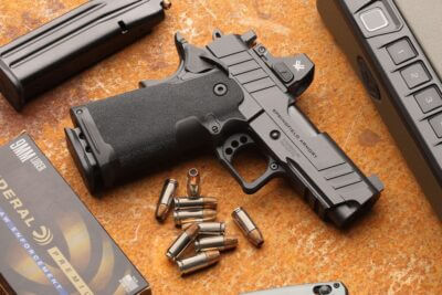 pringfield Armory 1911 DS Prodigy 3.5-inch AOS 9mm pistol with optic, magazine and ammunition