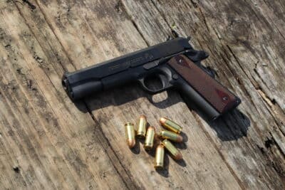 Colt 1911 pistol with 45 ACP ammunition