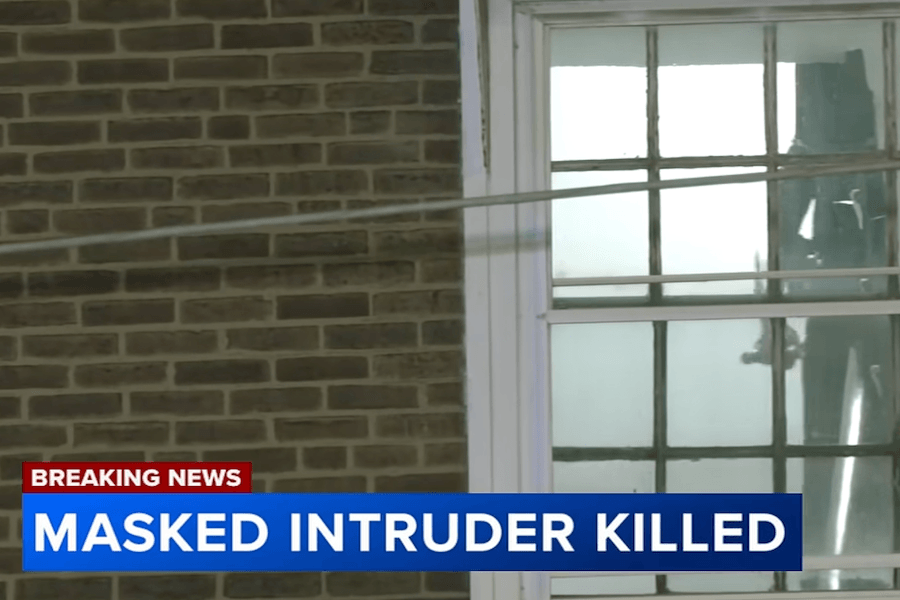 Philadelphia apartment building shown during coverage of a woman fatally shooting a masked intruder.